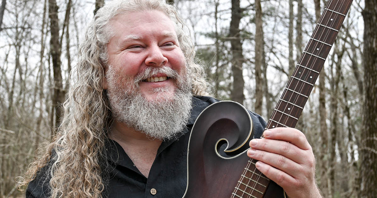 joe-jencks_600x600 Joe Jencks poses with a custom guitar in the woods